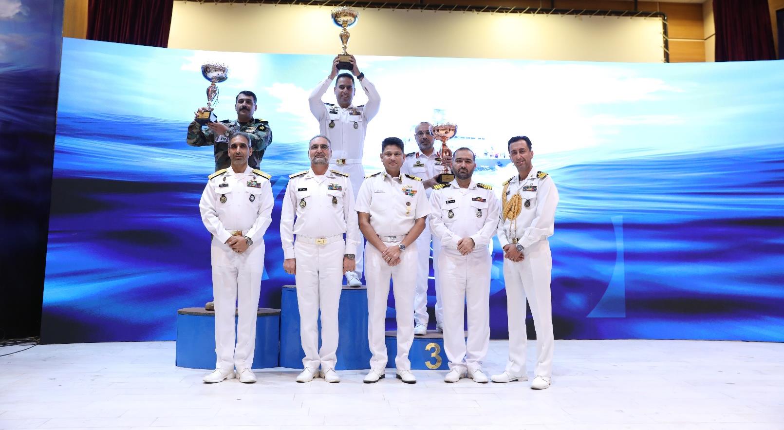 Trophy presentation on the winners' podium